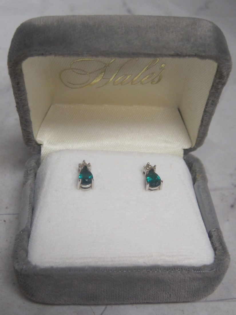 14k White Gold Emerald & Diamond Pierced Earrings: Weighs 1.3 grams. Approx. 2/3 cttw. Originally purchased from Hale's Jewelers- in original box 