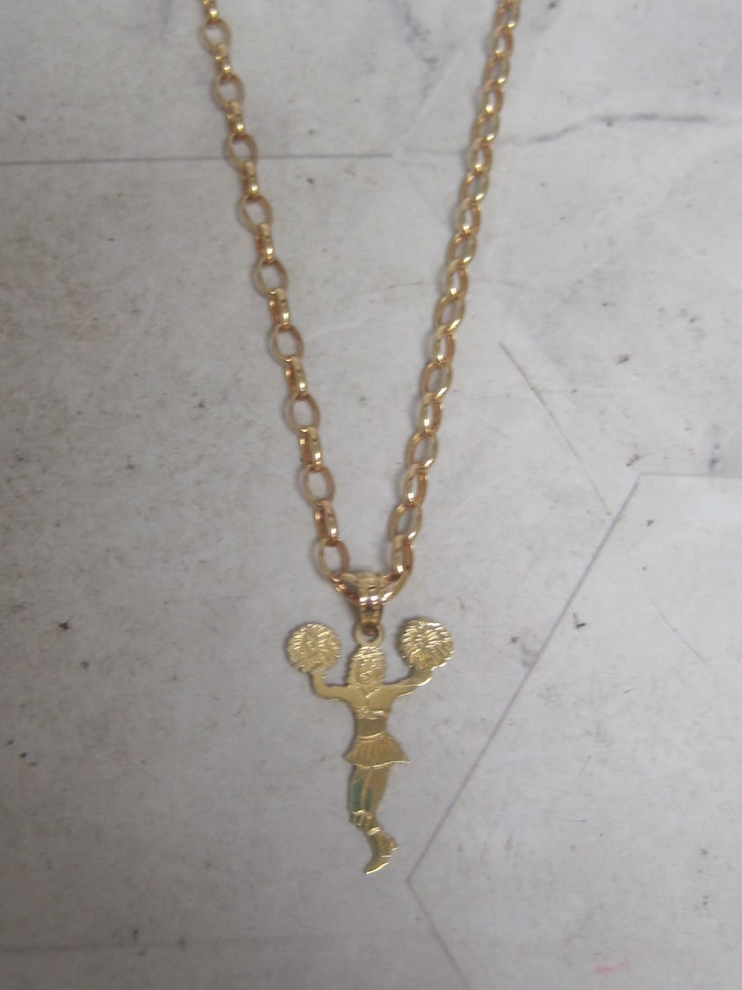 14k Gold 18" Chain with 14k Gold Cheerleader Pendant: Weighs 3 grams 
