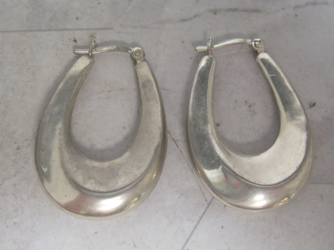 Sterling Silver Drop Hoop Earrings: Weighs 6.4 grams 