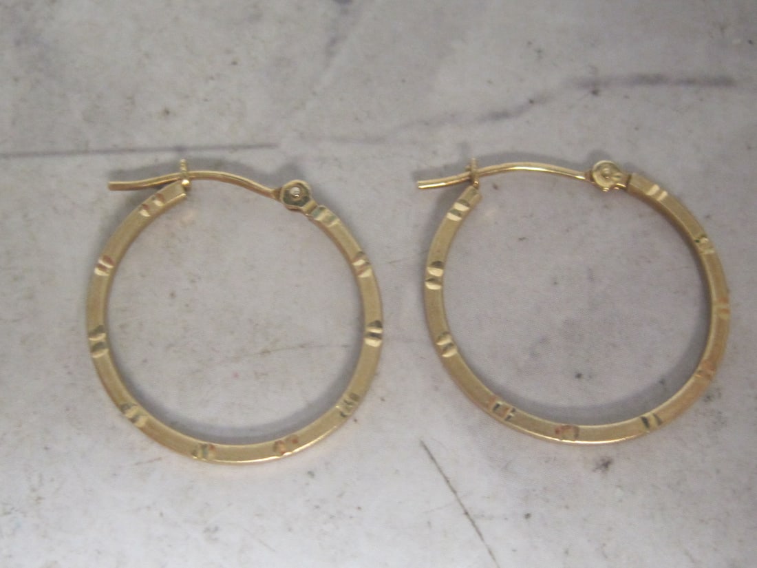14k Gold Hoop Earrings: Weighs 1 gram 