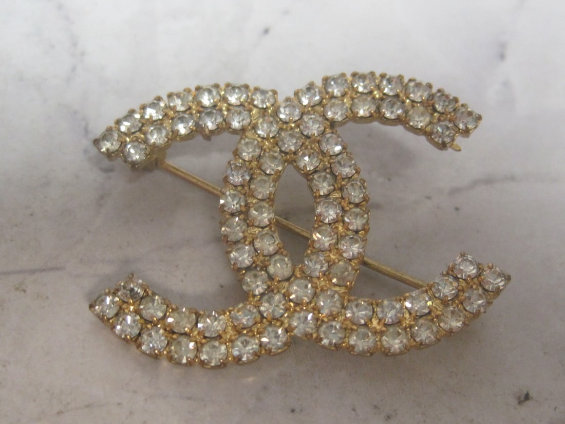 Vintage Chanel Rhinestone Logo Brooch: . 