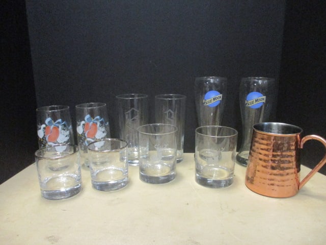 Grouping of 10 Glasses and Stainless Mug: . 