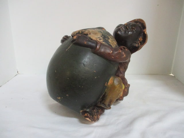 Vintage Handpainted Clay Black Americana Boy with Melon Jar: 11"h, boy is squatting holding melon, jar lid broken and has been repaired, some finish wear-see pictures and preview for condition 