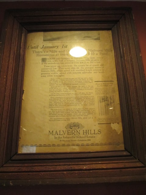 Framed December, 1925 Advertisement from Asheville Citizen Times for New: Malvern Hills Subdivision in the Asheville School Estate. Heavy wood frame 17" x 21", listing has price for homes, some age wear and discoloration 