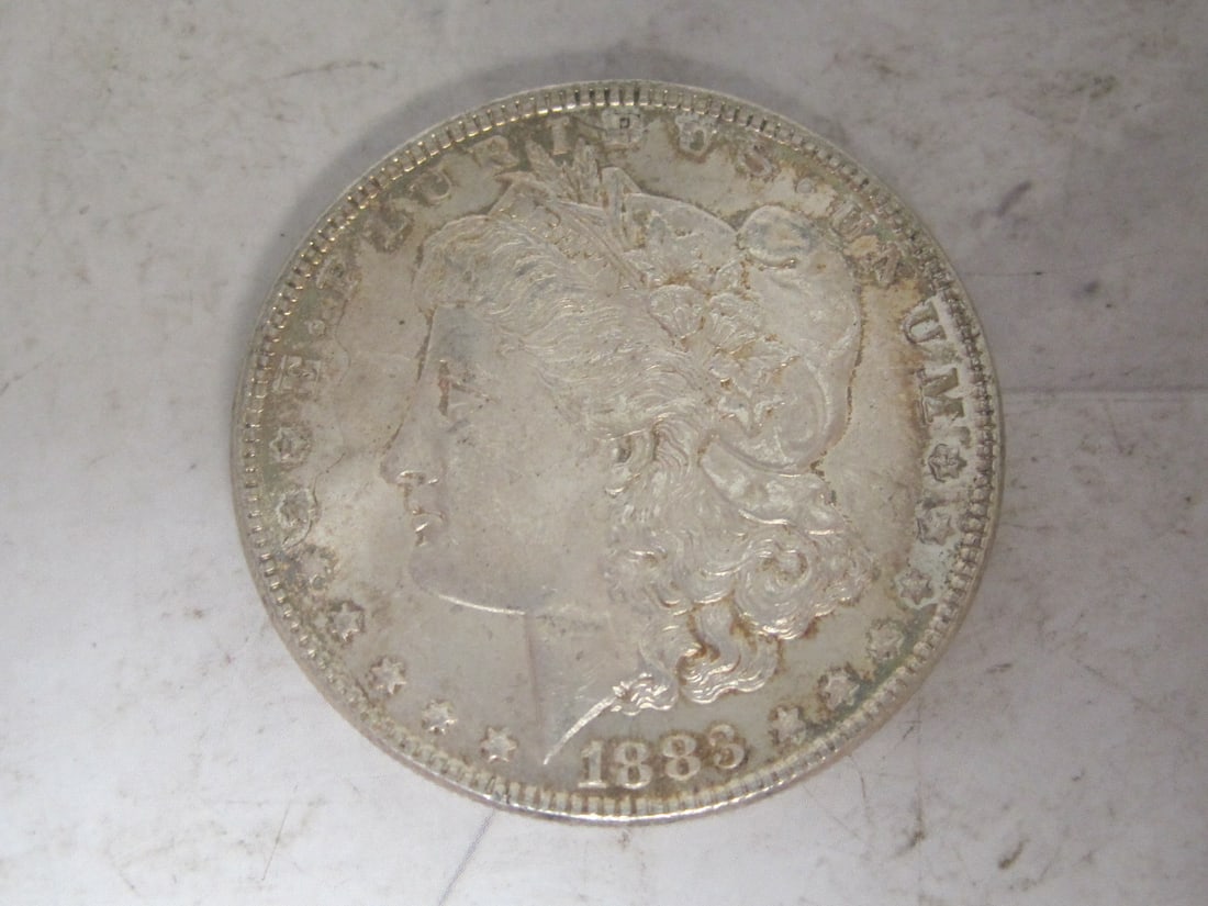 1883 Morgan Silver Dollar: . 