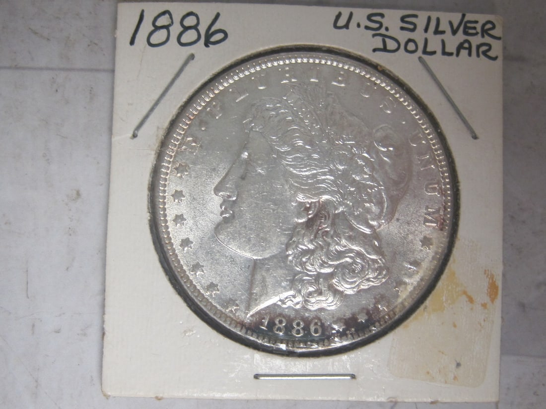 1886 Morgan Silver Dollar: . 