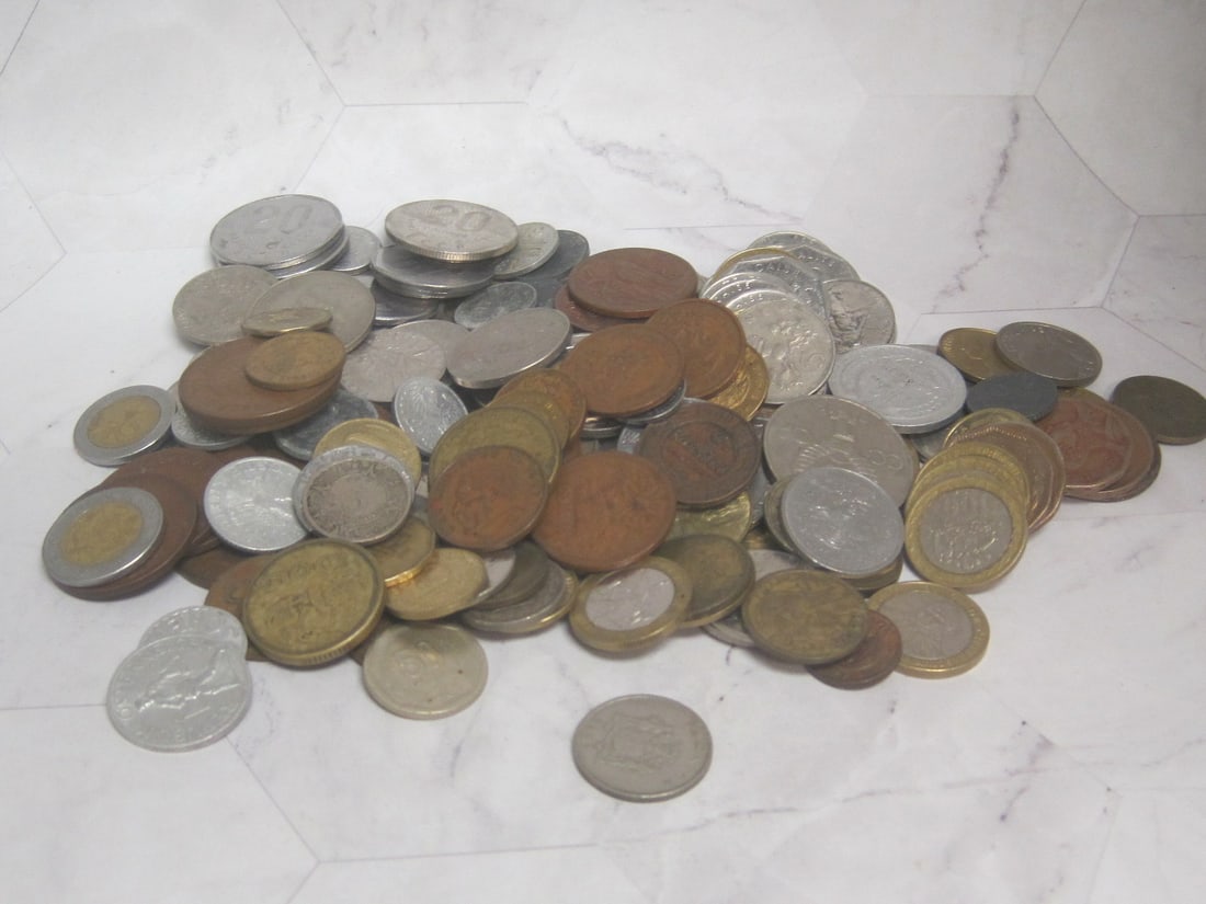 Huge Lot of Foreign Coins: Some may be silver