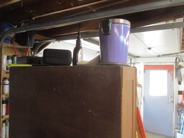 Cabinet Lot of Skilsaws, Ryobi Weedeater, Paint, Ratchet Straps, & More - 7