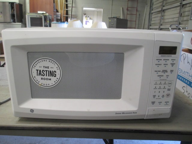 White GE Sensor Microwave Oven: Model JE1460WF 03, 22" x 17" x 12 1/2", powers on, Local Pickup Only 