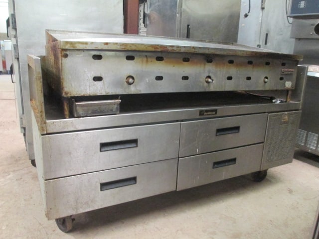 Commercial Garland Gas Flat Top Grill with Delfield 4 Drawer Refrigerated Stand: Grill 60" x 27 1/2" x 17", Delfield 68 1/4" x 31" x 36 1/2", grill flat top is missing knobs, was working when removed from arena, Local Pickup Only 