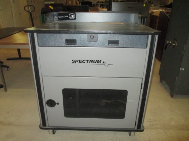 Spectrum Portable Lectern Podium: 38" x 28 1/2" x 43", has locking side drawer, has front and rear entry locking doors, has front drawer that is locked-Does not have key, has power cord reel on interior, Local Pickup Only 