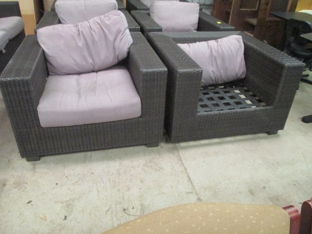 Pair of Woodard Woven Resin Patio Chairs: 40" x 26" x 37 1/2", one is missing seat cushion, cushions are very weathered, some loose weaving, See pictures and preview for condition, Local Pickup Only 