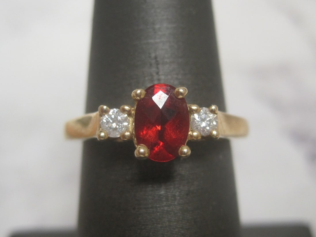 14k Gold Garnet & Diamond Ring: Weighs 2.9 grams, Size 7