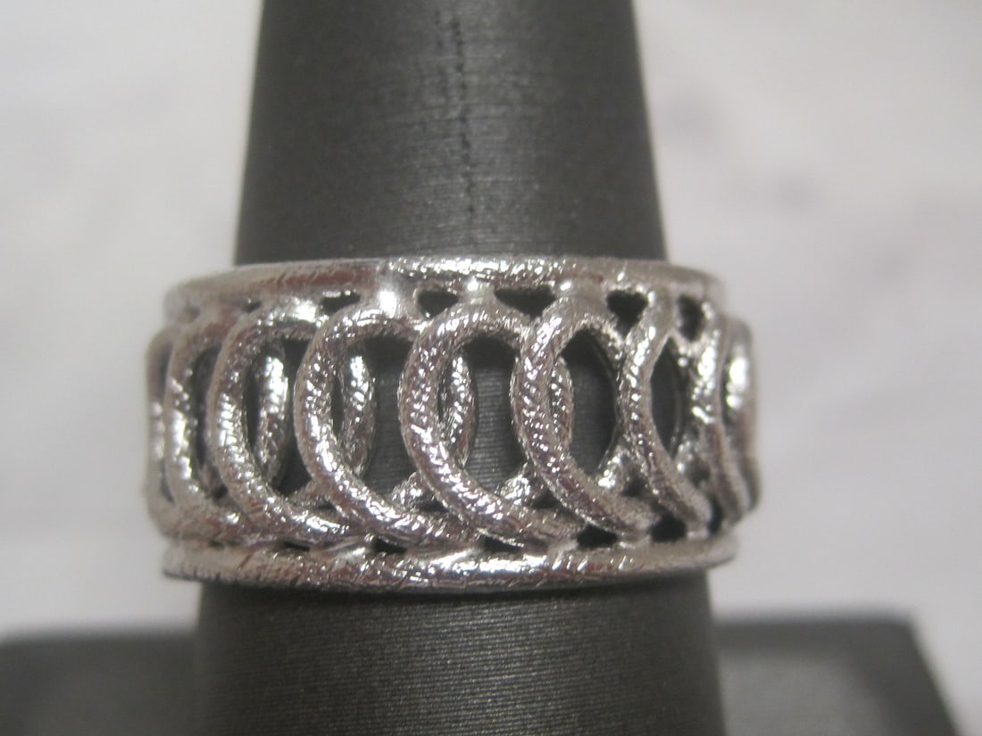 14k White Gold Milor Italian Band: Weighs 2 grams, Size 9, 3/8" wide with fancy rolling loop design