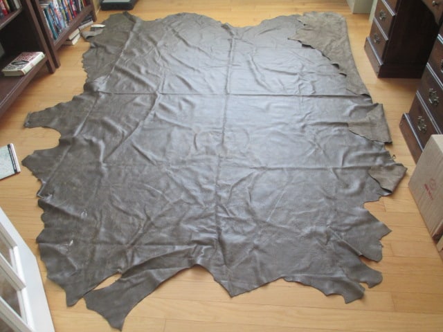 Prairie/Mocha Tanned Leather Hide: irregular edges approx. 96" x 120", has tag that reads DKT #4 Prairie