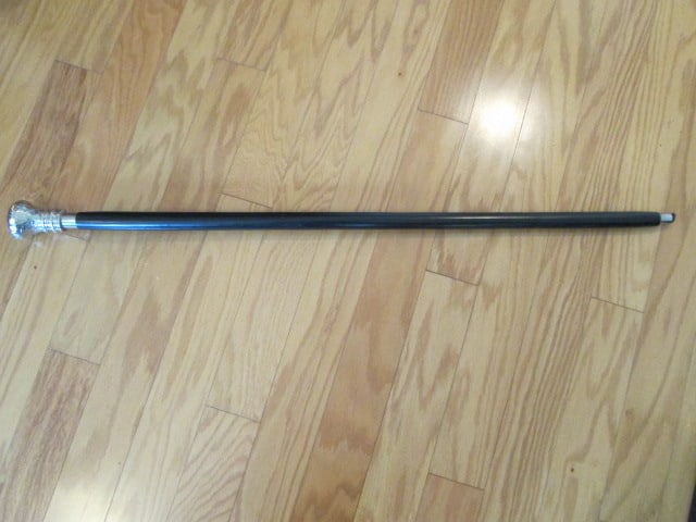 Black Lacquered Walking Cane with Engraved Scrolling Leaf Design Silverplate Pommel: 35 1/2" long