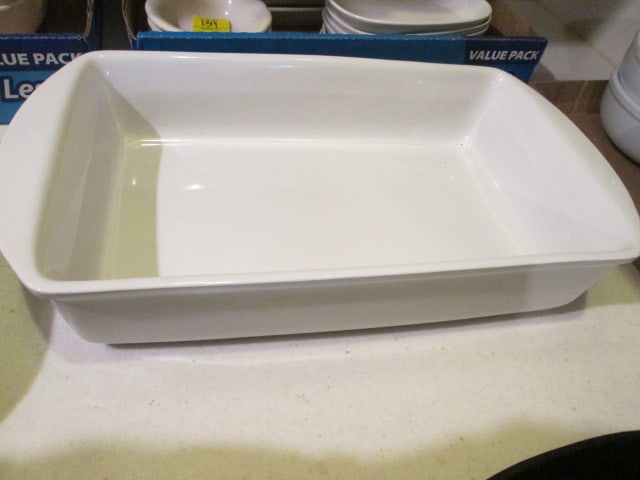 Over & Back Stoneware Baking Dish: Made in Portugal, 17"(handle to handle) x 9 1/4" x 3 1/4", small chip on bottom-glaze is not affected