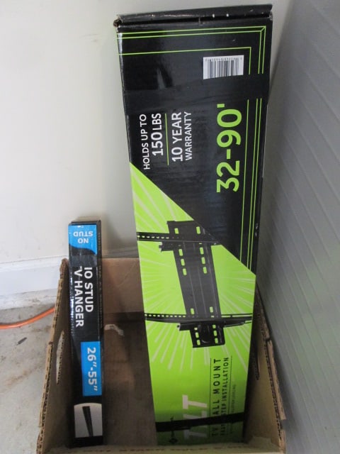 Member's Mark TILT 32"-90" TV Wall Mount and 26"-55" Studless TV Wall Mount Kit: Both in original boxes, but have been taped up-preview for completeness