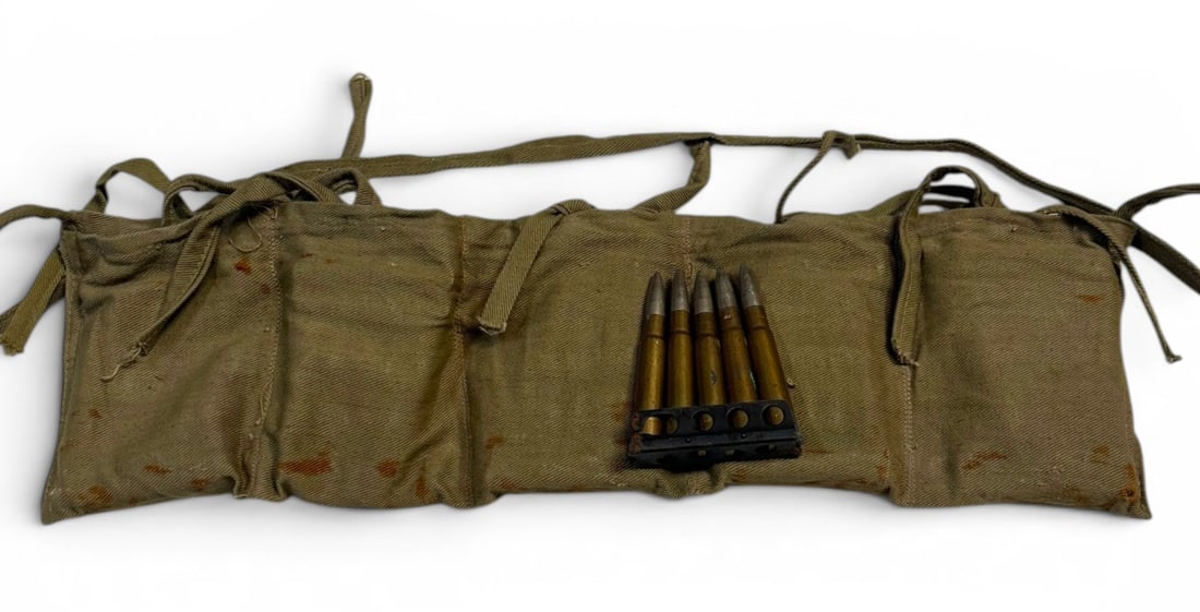 50rds of .303 British Ammunition on Stripper Clips in Bandolier: Military Surplus Ammunition. See Photos for Headstamps. There is some rust and corrosion present.