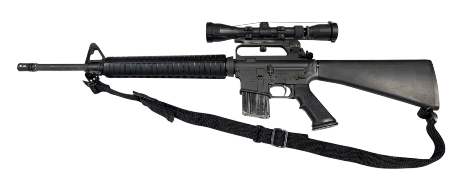Excellent PREBAN Colt Sporter Match HBAR .223 REM. Semi-Automatic Rifle with Armored Tasco Scope: S#: MH065883 | Model: 6601 | Manufactured Pre-1994 and considered PRE-BAN | 20" Heavy Barrel | Comes with (1) Colt-marked preban 20-round magazine | Correct Colt "C" Marked BCG | Comes with a correct 