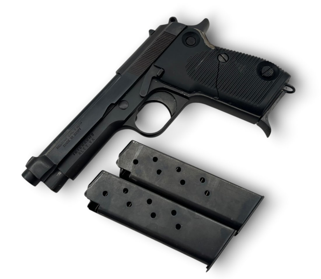 Egyptian Helwan Model 51 Beretta Clone 9mm Semi-Automatic Pistol: S#: 1117668 | 4.5" Barrel | Comes with (3) magazines | Imported by Interarms |||| CONDITION: Very good, with honest wear. Major crack in left grip panel. Right grip panel has minor crack towards top. 
