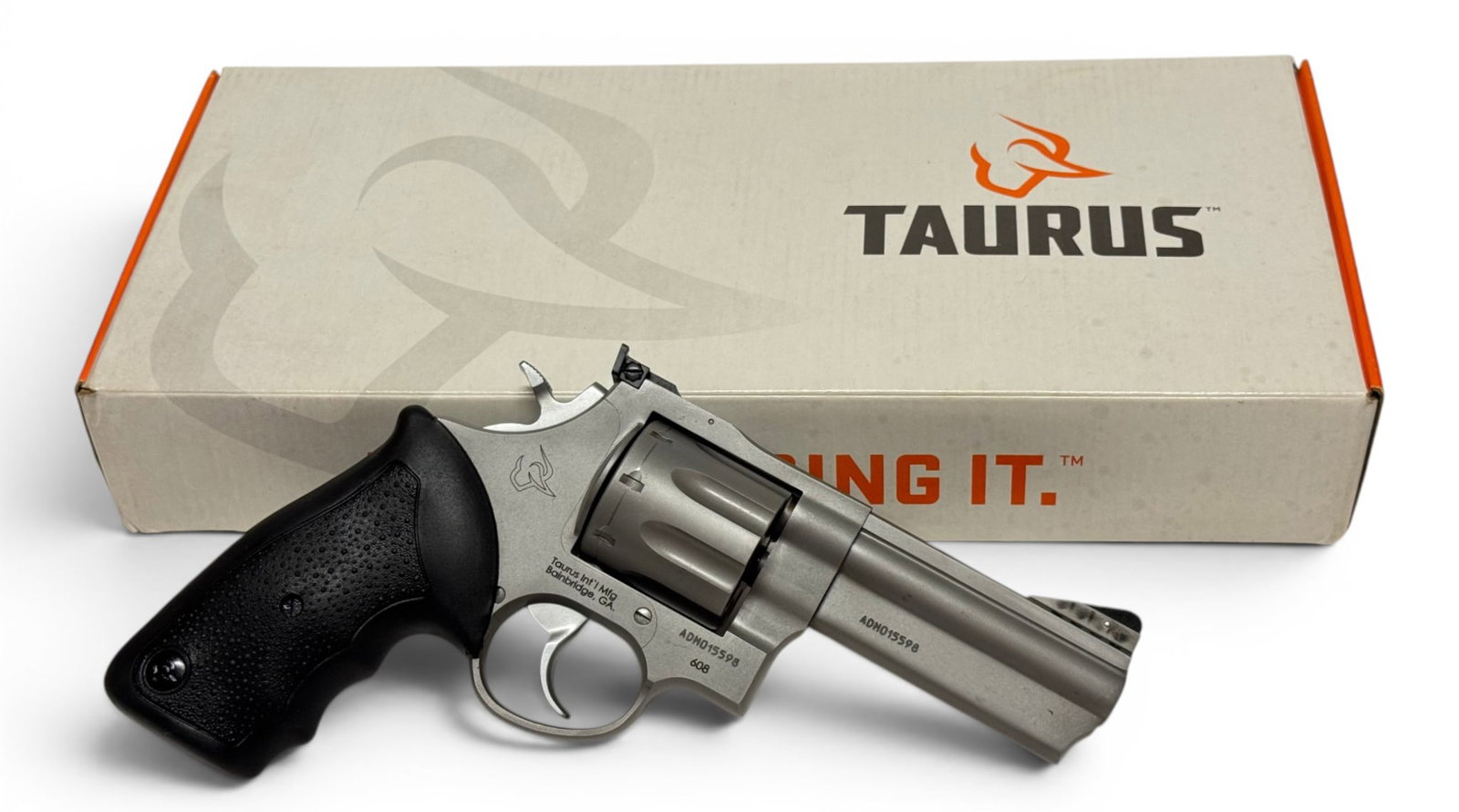 Excellent Taurus Model 608 .357 MAGNUM Revolver in Original Box: S#: ADM015598 | Model 2-608049 | 4" Barrel | 8-Shot SA/DA | Comes in factory box with matching label, manual and gun lock |||| CONDITION: Excellent, showing signs of use. Mechanically functions. Bore