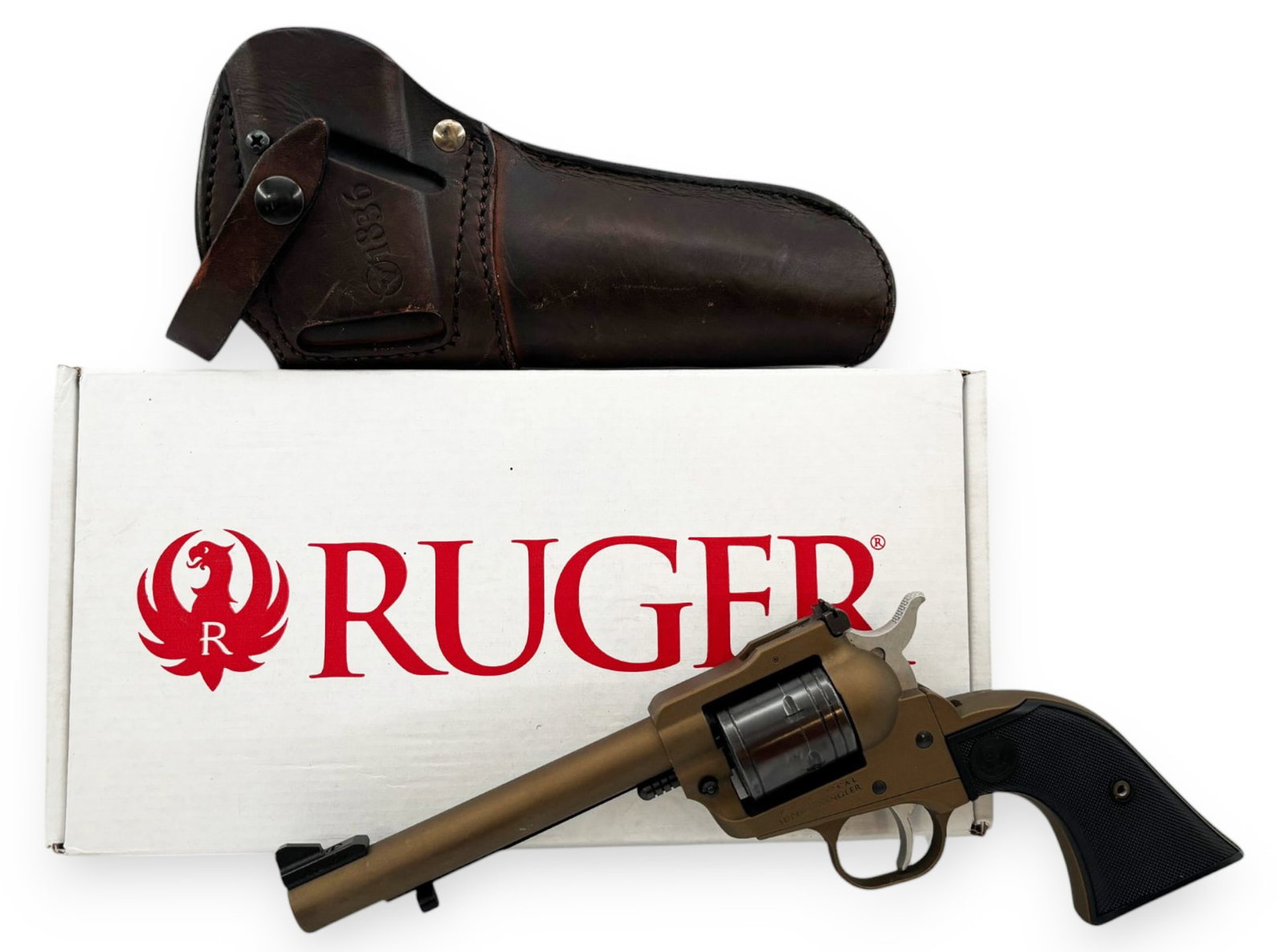 Excellent Ruger Super Wrangler .22 LR Single Action Revolver with Holster in Original Box: S#: 207-94678 | 5.5" Barrel | 6-Shot SA | Comes with leather 1836 holster | Comes in original box with manual, gun lock and receipt | Factory Burnt Bronze Cerakote |||| CONDITION: Excellent.