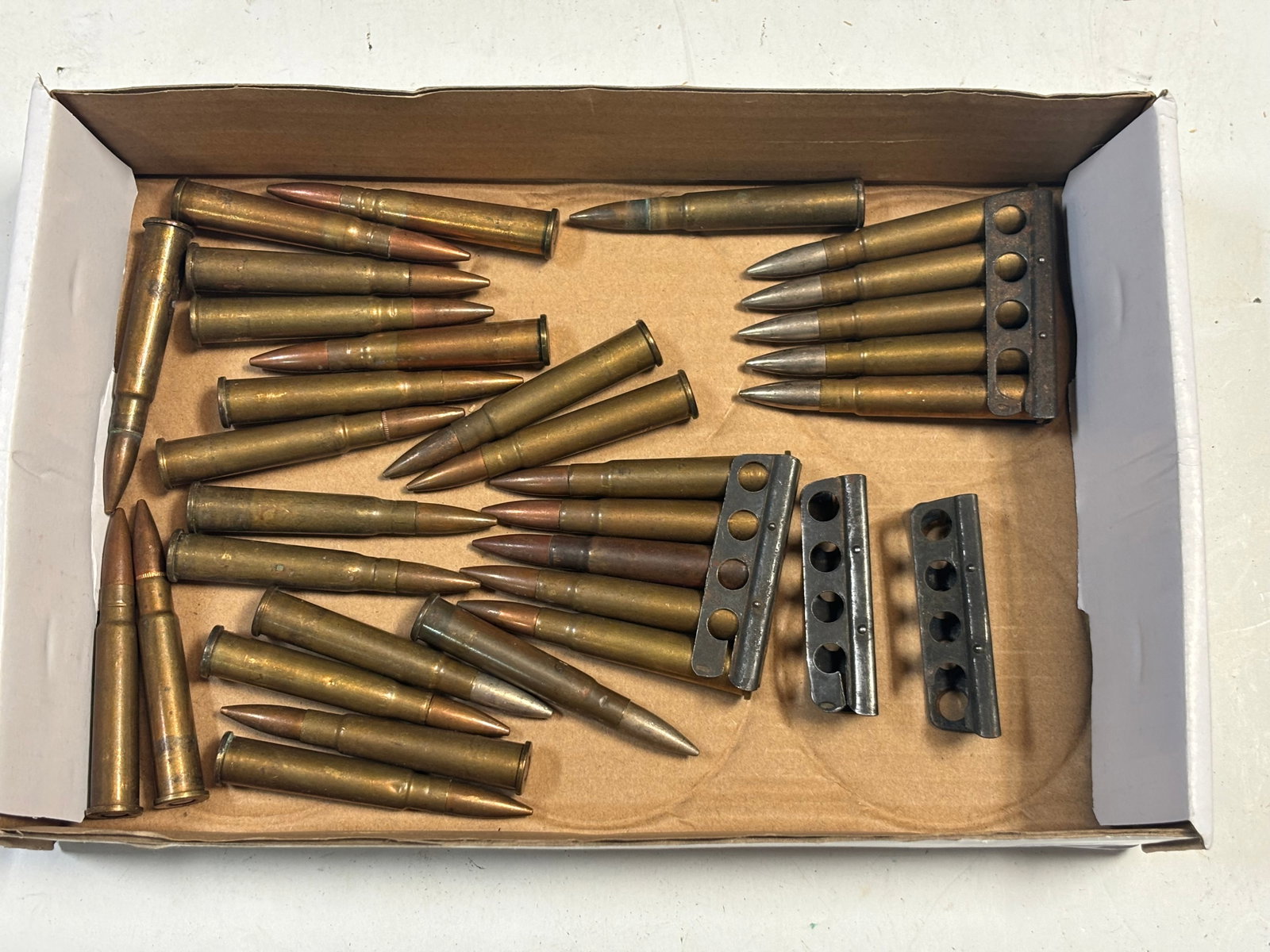 30rds. Of Various .303 BRITISH Ammunition with (4) Stripper Clips: See photos for headstamps