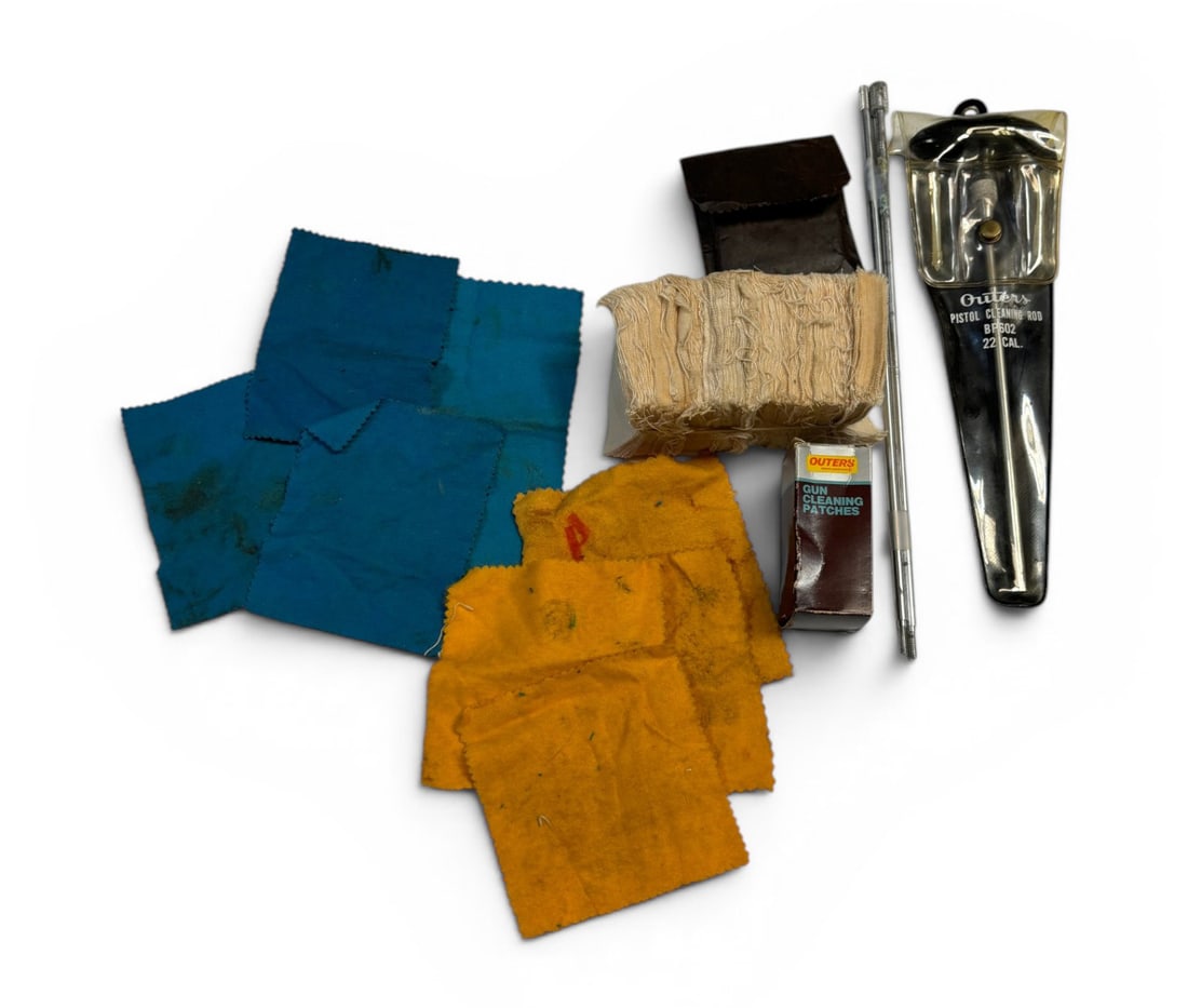 Vintage Gun Cleaning Supplies: Complete Outers pistol cleaning rod .22 Cal. kit, unknown stainless steel cleaning rod, Outers gun cleaning pouches in box, gun cleaning patches in brown case, approx. (250) cleaning patches and (7)