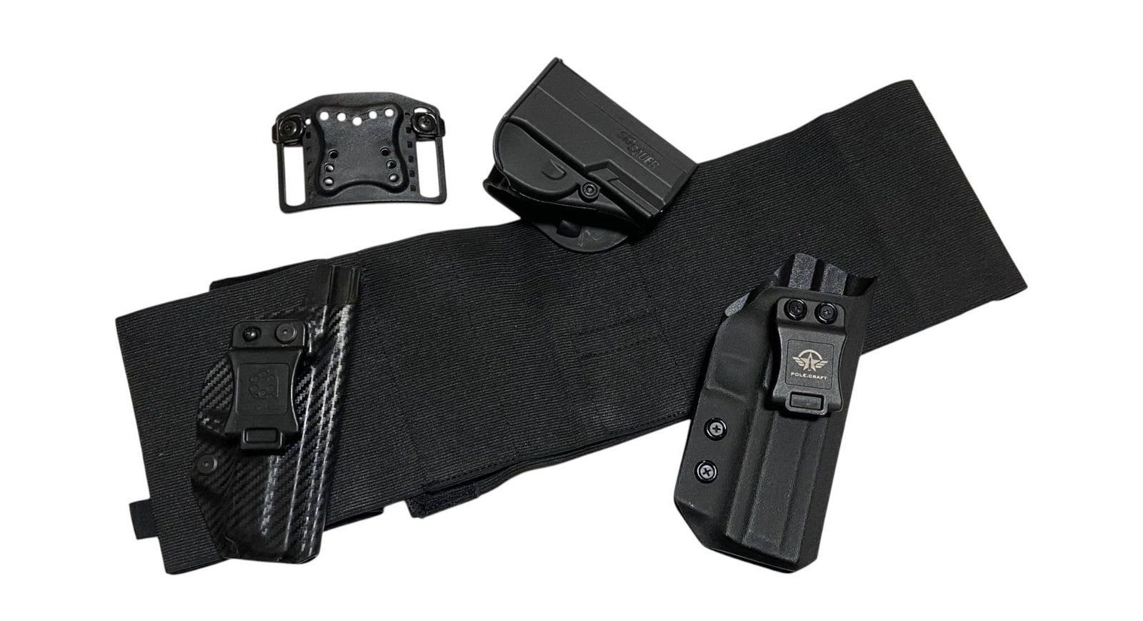 (3) Pistol Holsters, Paddle, and Belly Wrap Holster: See photos for what’s all here