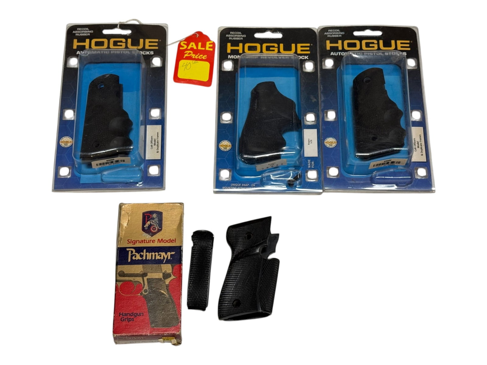 (3) NIB Hogue Automatic Pistol Stocks and (1) NIB Pachmayr Signature Model Handgun Grips: See photos