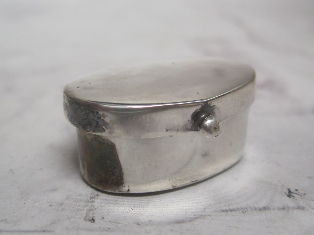 Sterling Silver Pill Box: Weighs 10.5 grams, 1 1/4" x 1", oval