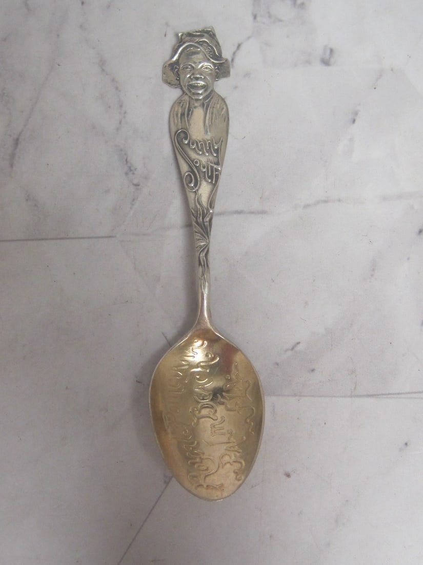 Sunny South Black Americana Sterling Silver Souvenir Spoon: Weighs 10.2 grams, 4 1/4", circa 1900, Young man at top, Royal Poinciana, Palm Beach, Florida in gold wash bowl