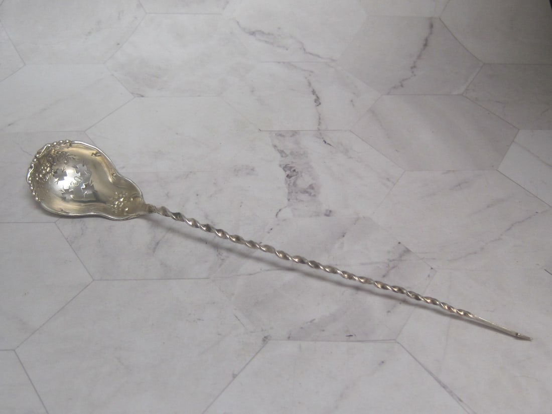 Victorian Sterling Silver Olive Spoon: Weighs 12.5 grams, 8 1/2" long, Spear end, twist handle, openwork bowl