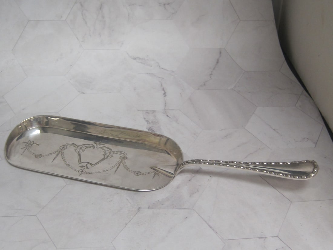 English Victorian Silverplate Crumber: 11 1/2" long, Adams style decoration