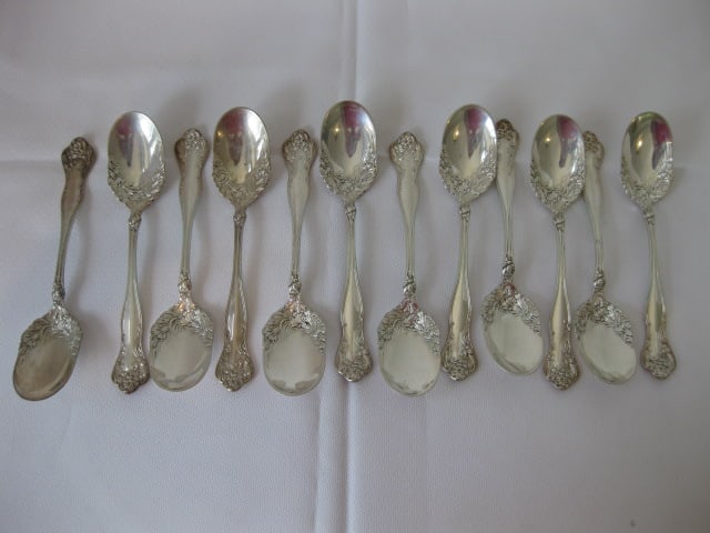 12 Vintage Victorian Sterling Spoons with Floral Design: 12.10 troy ounces total weight, each measures 5 7/8" long, has Old Style Towle Silversmiths symbol and Pat. Sterling