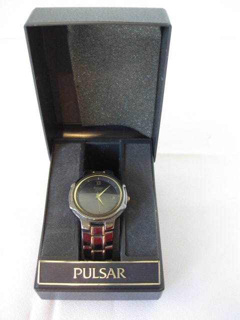 Pulsar Solar Classic Black and Gold Tone Wrist Watch in Original Box: Marked 090570, V145-0C00, marked No Battery Required