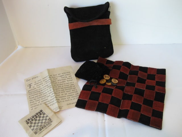 Tigo Leather Travel Chess/Checker Set: .