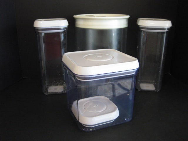 Three OXO and One Clickclack Vacuum Seal Storage Containers: .