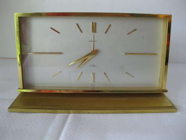 Gubelin Swiss 8 Day Wind-Up Brass Alarm Clock: 6 3/8" x 1 3/4" x 3 3/4", winds and ticks, alarms rings