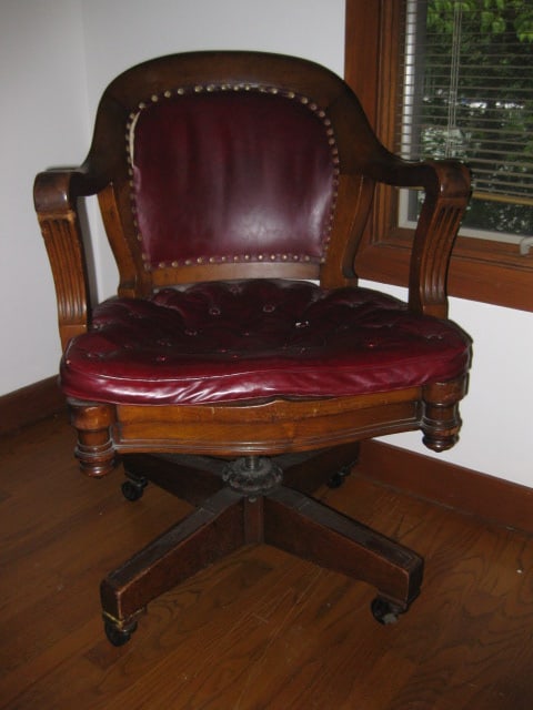 Vintage Spak & Natovich Wood Banker's Chair with Leather Seat/Back: 24"w, missing a few buttons in seat, seat and back have a few tears, Local Pickup Only