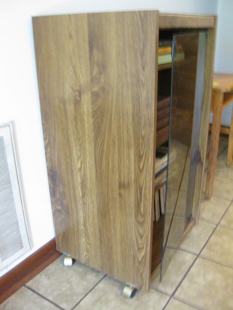 Record Cabinet with Various Speed Records - 13