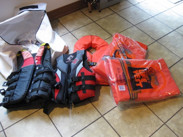 Safety Gear Bag with Five Personal Floatation Life Jackets: Adult and kids sizes, two appear new, Local Pickup Only