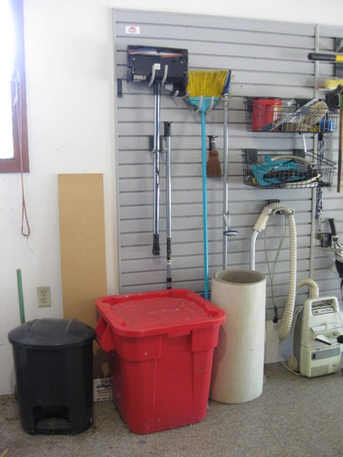 Right Side Garage Wall Contents-Rubbermaid Yard Tool Organizer, 5' Wood A Frame Ladder, - 5