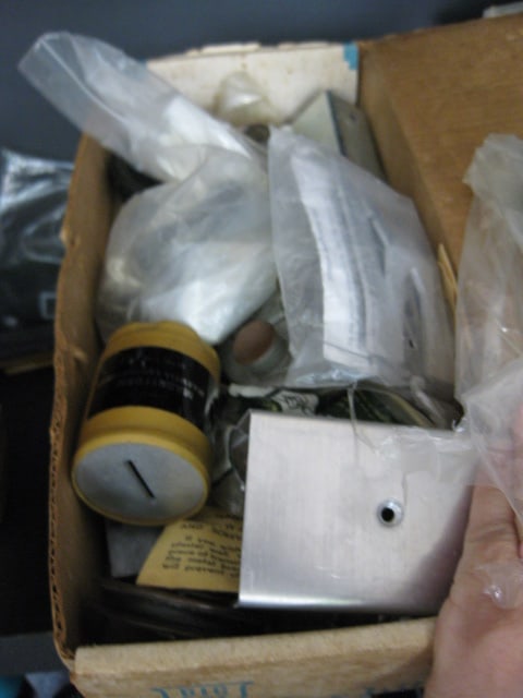 Contents of Garage Storage Cabinets-Light Bulbs, Coolers, Step Stool, Jacks, Cleaners, etc. - 12