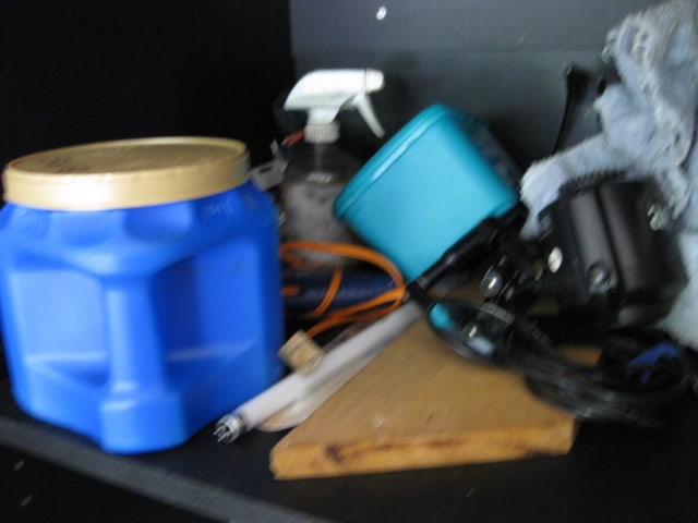 Contents of Garage Storage Cabinets-Light Bulbs, Coolers, Step Stool, Jacks, Cleaners, etc. - 15