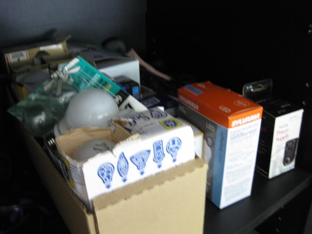 Contents of Garage Storage Cabinets-Light Bulbs, Coolers, Step Stool, Jacks, Cleaners, etc. - 16