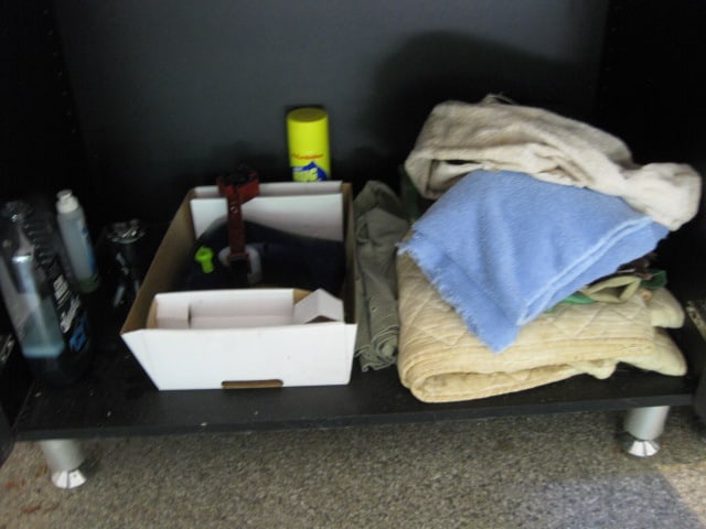 Contents of Garage Storage Cabinets-Light Bulbs, Coolers, Step Stool, Jacks, Cleaners, etc. - 19