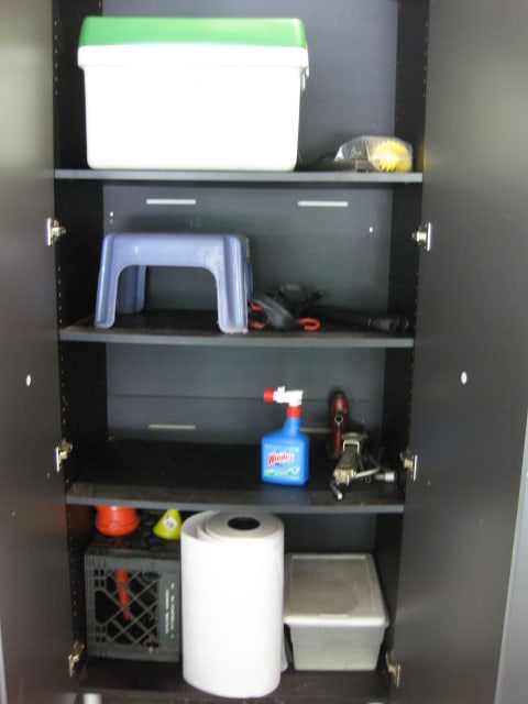 Contents of Garage Storage Cabinets-Light Bulbs, Coolers, Step Stool, Jacks, Cleaners, etc. - 5