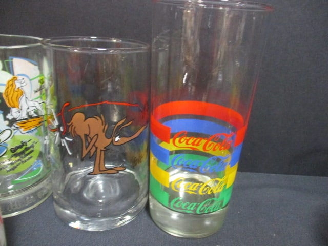4 Walt Disney World Collector's Glasses, 2 J.Cleveland Glasses, Coca-Cola - 4